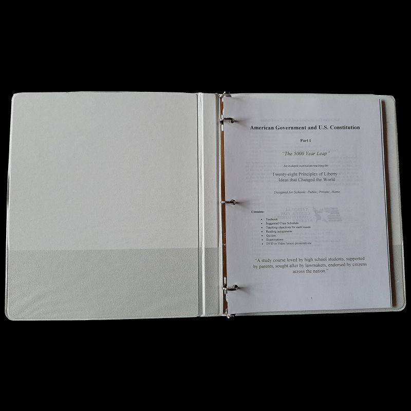 3-ring binder open to cover page.